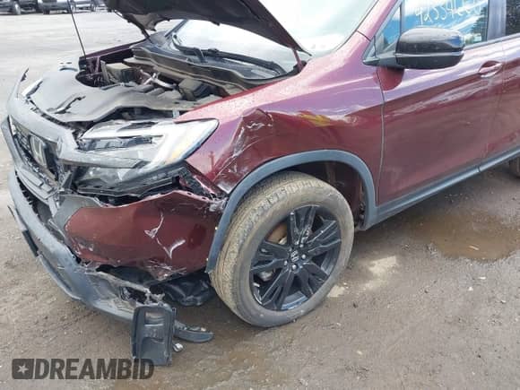2019 Honda Passport Sport with VIN 5FNYF8H21KB010014, listed as a IAAI auction lot 42334660 with 76,548 mi miles and . Bid and sale history available at DreamBid. Image 6.