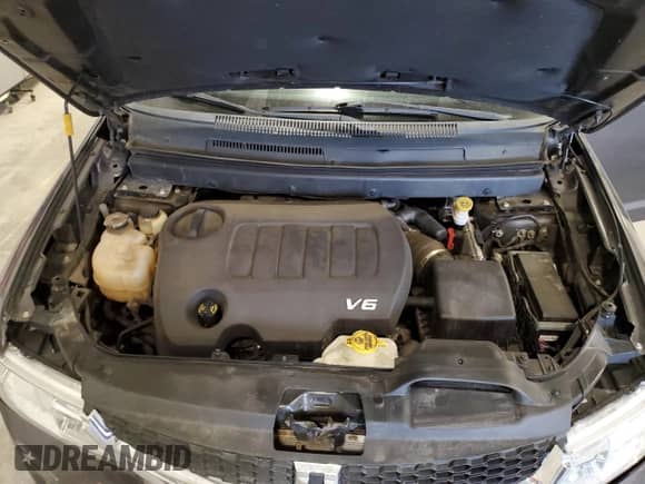 2017 Dodge Journey SXT with VIN 3C4PDDBG1HT703237, listed as a Copart auction lot 71018395 with 82,536 mi miles and Salvage title. Bid and sale history available at DreamBid. Image 12.