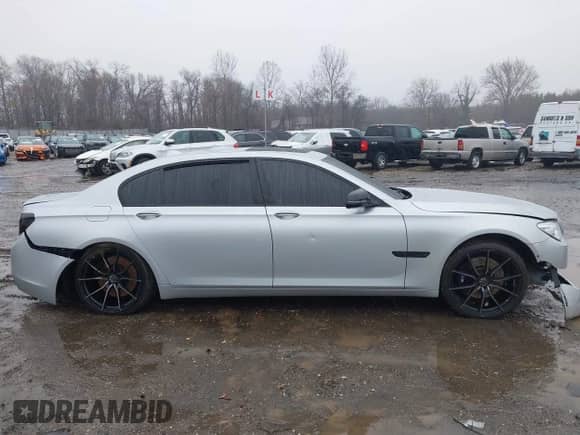 2014 BMW 7 Series ALPINA B7 xDrive with VIN WBAYF8C56ED653257, listed as a IAAI auction lot 41105402 with 81,462 mi miles and . Bid and sale history available at DreamBid. Image 13.
