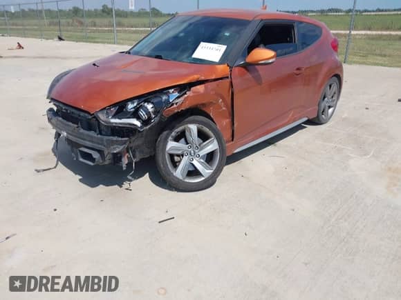 2013 Hyundai Veloster Turbo с VIN KMHTC6AE4DU169787, выставлен на аукционе IAAI как лот 43334701 с пробегом 114 117 миль миль и . История ставок и продаж доступна на DreamBid. Изображение 2.
