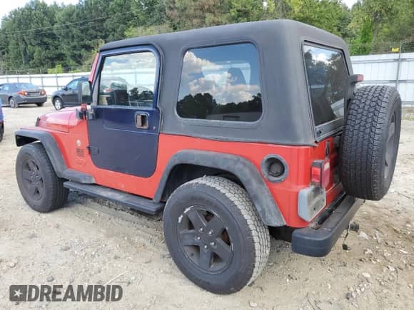 1997 Jeep Wrangler SE with VIN 1J4FY29P2VP473972, listed as a Copart auction lot 70339135 with 243,412 mi miles and Salvage title. Bid and sale history available at DreamBid. Image 2.