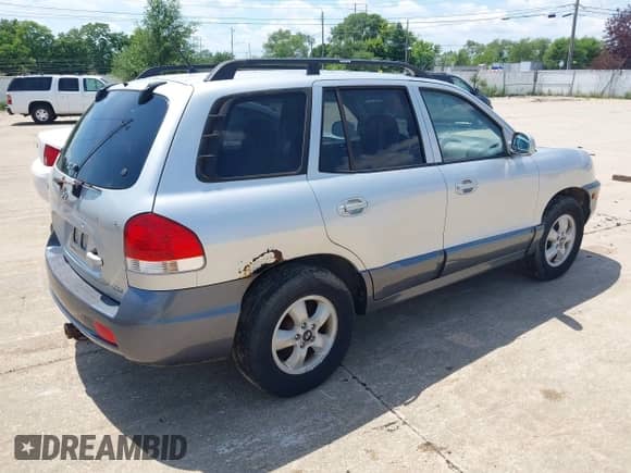 2005 Hyundai Santa Fe GLS z VIN KM8SC73D75U974612, wystawiony jako IAAI lot #42687027 z przebiegiem 187 251 mil mil oraz . Historia ofert i sprzedaży dostępna na DreamBid. Obrazek 4.