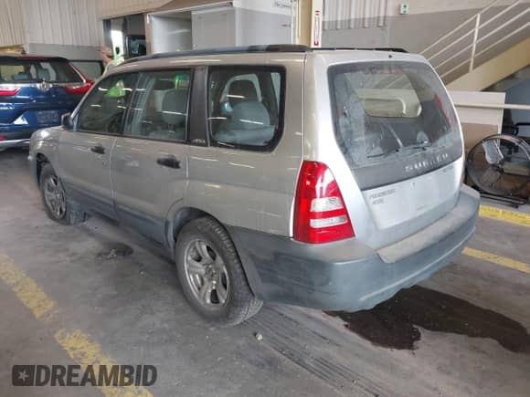 2004 Subaru Forester X with VIN JF1SG63604H737591, listed as a IAAI auction lot 42533905 with 188,163 mi miles and . Bid and sale history available at DreamBid. Image 3.