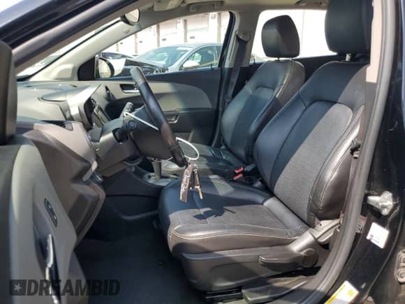 2016 Chevrolet Sonic LTZ with VIN 1G1JE6SB2G4163008, listed as a Copart auction lot 59600135 with 106,564 mi miles and Clean title. Bid and sale history available at DreamBid. Image 7.