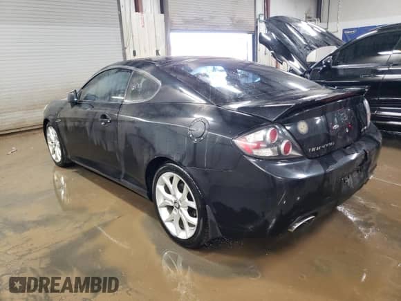 2008 Hyundai Tiburon GT with VIN KMHHN66F38U279074, listed as a Copart auction lot 87723645 with 125,280 mi miles and Salvage title. Bid and sale history available at DreamBid. Image 2.