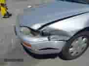 1995 Toyota Camry LE z VIN 4T1GK12E0SU860849, wystawiony jako IAAI lot #42358373 z przebiegiem 162 463 mil mil oraz . Historia ofert i sprzedaży dostępna na DreamBid. Obrazek 6.