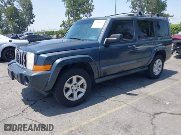 2007 Jeep Commander Sport with VIN 1J8HH48KX7C548033, listed as a IAAI auction lot 42555217 with 213,236 mi miles and . Bid and sale history available at DreamBid. Image 18.