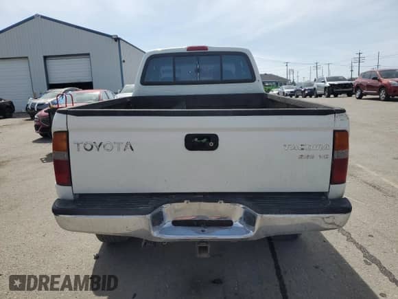 1997 Toyota Tacoma z VIN 4TAWN72N4VZ239482, wystawiony jako Copart lot #56564145 z przebiegiem 151 318 mil mil oraz Szkoda całkowita • Salvage title. Historia ofert i sprzedaży dostępna na DreamBid. Obrazek 6.