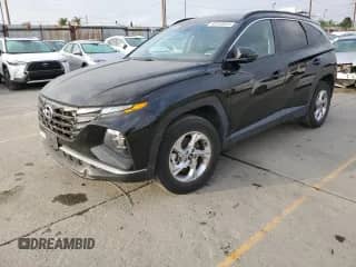 2023 Hyundai Tucson SEL with VIN 5NMJBCAE8PH215906, listed as a Copart auction lot 89703535 with 63,217 mi miles and Salvage title. Bid and sale history available at DreamBid. Image 1.