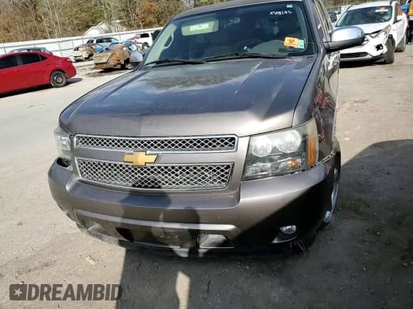 2014 Chevrolet Suburban LTZ with VIN 1GNSCKE03ER151784, listed as a Copart auction lot 43482165 with 247,413 mi miles and Salvage title. Bid and sale history available at DreamBid. Image 11.