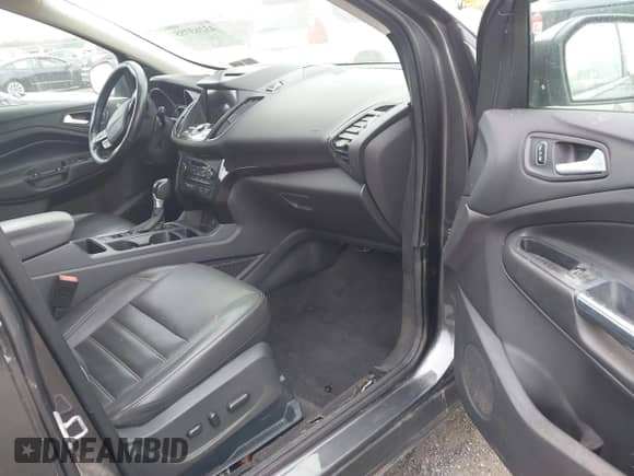 2017 Ford Escape Titanium с VIN 1FMCU9JD9HUB78027, выставлен на аукционе IAAI как лот 43263755 с пробегом 137 565 миль миль и . История ставок и продаж доступна на DreamBid. Изображение 5.