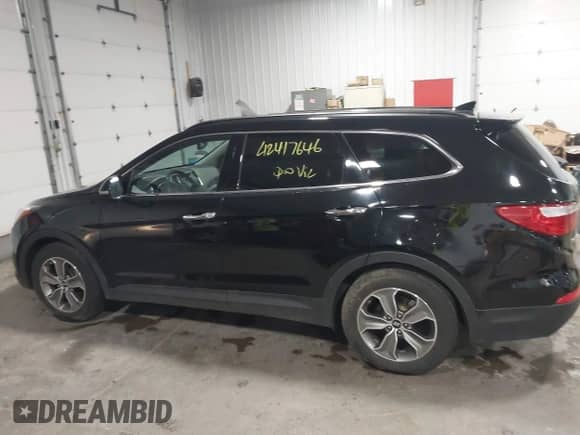 2014 Hyundai Santa Fe Limited with VIN KM8SNDHF2EU035158, listed as a IAAI auction lot 42417646 with 127,455 mi miles and . Bid and sale history available at DreamBid. Image 14.