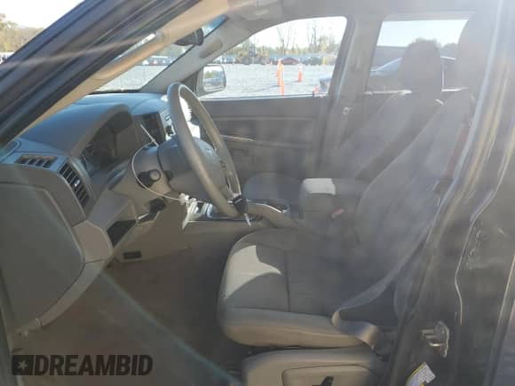 2006 Jeep Grand Cherokee Laredo with VIN 1J4HR48N86C194486, listed as a Copart auction lot 86637195 with 127,284 mi miles and Salvage title. Bid and sale history available at DreamBid. Image 7.