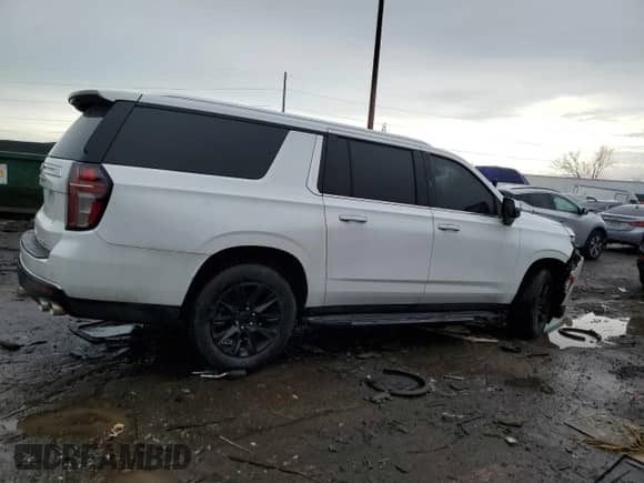 2021 Chevrolet Suburban Premier с VIN 1GNSCFKD9MR284417, выставлен на аукционе Copart как лот 47981755 с пробегом 53 316 миль миль и На запчасти • Non repairable. История ставок и продаж доступна на DreamBid. Изображение 3.