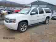 2014 Chevrolet Suburban LTZ with VIN 1GNSKKE77ER152002, listed as a IAAI auction lot 41930865 with 159,393 mi miles and . Bid and sale history available at DreamBid. Image 19.