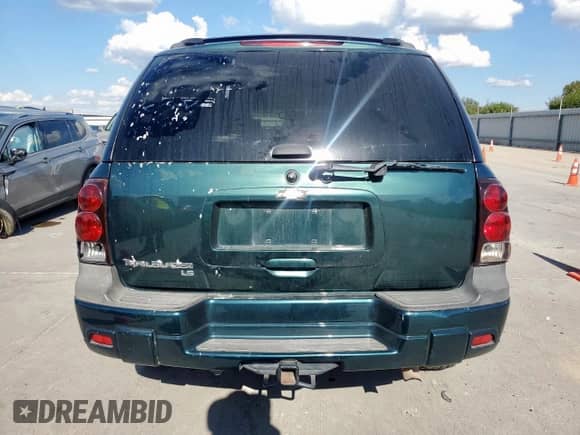 2005 Chevrolet TrailBlazer LT с VIN 1GNDS13S652133511, выставлен на аукционе Copart как лот 85477745 с пробегом 336 768 миль миль и Списание • Salvage title. История ставок и продаж доступна на DreamBid. Изображение 6.