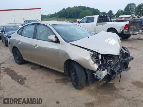 2009 Hyundai Elantra SE z VIN KMHDU46D99U662300, wystawiony jako IAAI lot #42839675 z przebiegiem 118 975 mil mil oraz . Historia ofert i sprzedaży dostępna na DreamBid. Obrazek 1.