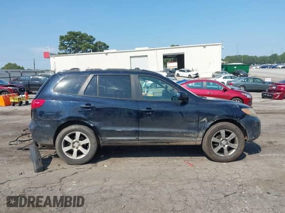 2007 Hyundai Santa Fe SE with VIN 5NMSH13E97H052817, listed as a IAAI auction lot 43136191 with 265,353 mi miles and . Bid and sale history available at DreamBid. Image 13.