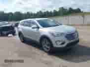2014 Hyundai Santa Fe GLS with VIN KM8SN4HF1EU049410, listed as a IAAI auction lot 42660800 with 130,118 mi miles and . Bid and sale history available at DreamBid. Image 1.