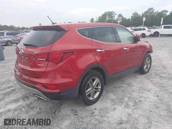 2018 Hyundai Santa Fe 2.4L with VIN 5XYZT3LB1JG556195, listed as a IAAI auction lot 43310112 with 132,565 mi miles and . Bid and sale history available at DreamBid. Image 4.