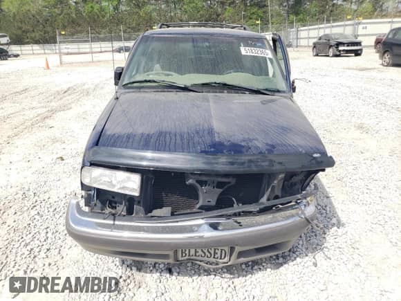 1999 Chevrolet Blazer LS z VIN 1GNCS13W3X2174681, wystawiony jako Copart lot #51832365 z przebiegiem 209 536 mil mil oraz Szkoda całkowita • Salvage title. Historia ofert i sprzedaży dostępna na DreamBid. Obrazek 5.