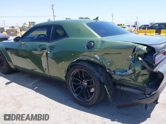 2022 Dodge Challenger R/T Scat Pack Widebody z VIN 2C3CDZFJ8NH177621, wystawiony jako IAAI lot #42358022 z przebiegiem 19 076 mil mil oraz . Historia ofert i sprzedaży dostępna na DreamBid. Obrazek 6.