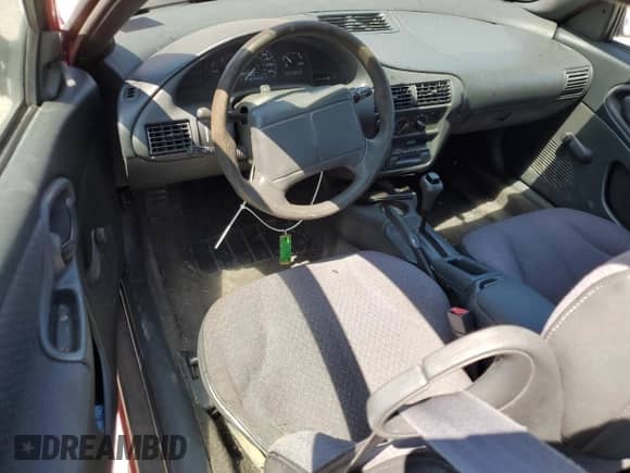 1997 Chevrolet Cavalier z VIN 1G1JC1244V7110364, wystawiony jako Copart lot #68510134 z przebiegiem 107 162 mil mil oraz Czysty tytuł • Clean title. Historia ofert i sprzedaży dostępna na DreamBid. Obrazek 8.