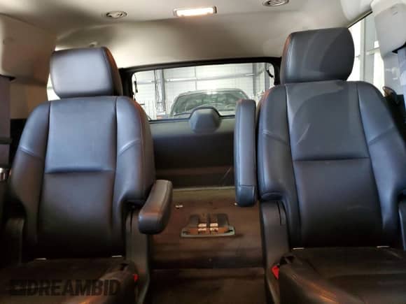 2014 Chevrolet Tahoe LTZ z VIN 1GNSKCE05ER127284, wystawiony jako Copart lot #85735245 z przebiegiem 152 890 mil mil oraz Czysty tytuł • Clean title. Historia ofert i sprzedaży dostępna na DreamBid. Obrazek 10.