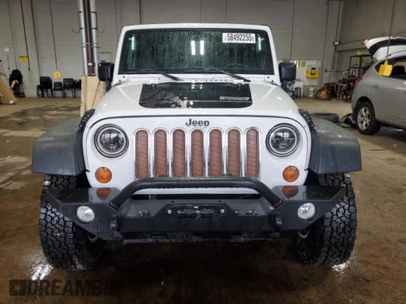 2013 Jeep Wrangler Rubicon 10th Anniversary with VIN 1C4BJWCGXDL543958, listed as a Copart auction lot 58492255 with 94,455 mi miles and Salvage title. Bid and sale history available at DreamBid. Image 5.