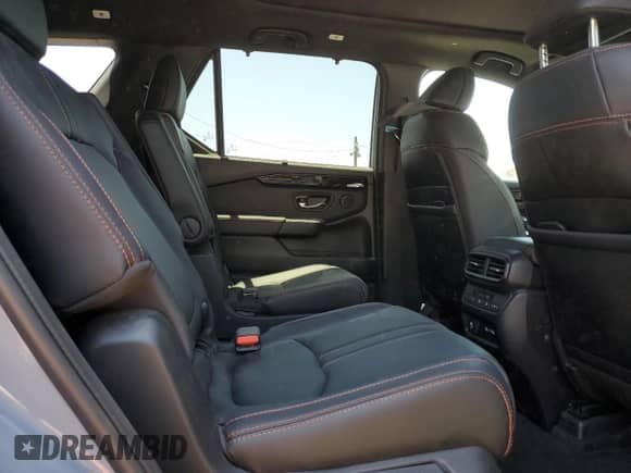 2023 Honda Pilot TrailSport z VIN 5FNYG1H62PB022686, wystawiony jako Copart lot #61501465 z przebiegiem 32 095 mil mil oraz Szkoda całkowita • Salvage title. Historia ofert i sprzedaży dostępna na DreamBid. Obrazek 11.