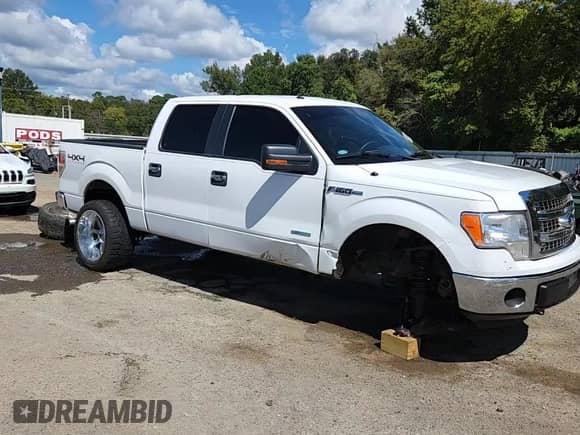 2013 Ford F-150 Lariat with VIN 1FTFW1ET9DKG40123, listed as a Copart auction lot 85496405 with 212,562 mi miles and Salvage title. Bid and sale history available at DreamBid. Image 14.