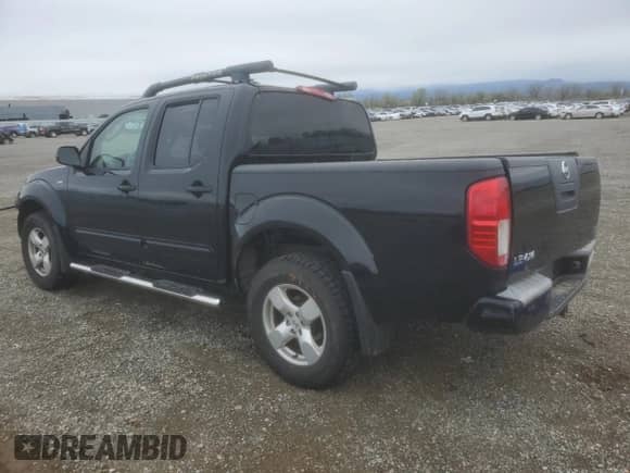 2007 Nissan Frontier LE with VIN 1N6AD07W17C401906, listed as a Copart auction lot 49831275 with 137,696 mi miles and Salvage title. Bid and sale history available at DreamBid. Image 2.