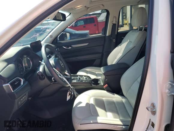 2024 Mazda CX-5 S Carbon Edition z VIN JM3KFBCM5R0352688, wystawiony jako Copart lot #66491765 z przebiegiem 20 904 mil mil oraz Szkoda całkowita • Salvage title. Historia ofert i sprzedaży dostępna na DreamBid. Obrazek 7.