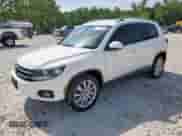 2014 Volkswagen Tiguan S with VIN WVGAV3AX2EW543398, listed as a Copart auction lot 67066455 with 111,277 mi miles and Clean title. Bid and sale history available at DreamBid. Image 1.