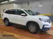 2022 Honda Pilot EX-L with VIN 5FNYF6H51NB033201, listed as a Copart auction lot 66617825 with 62,310 mi miles and Salvage title. Bid and sale history available at DreamBid. Image 4.