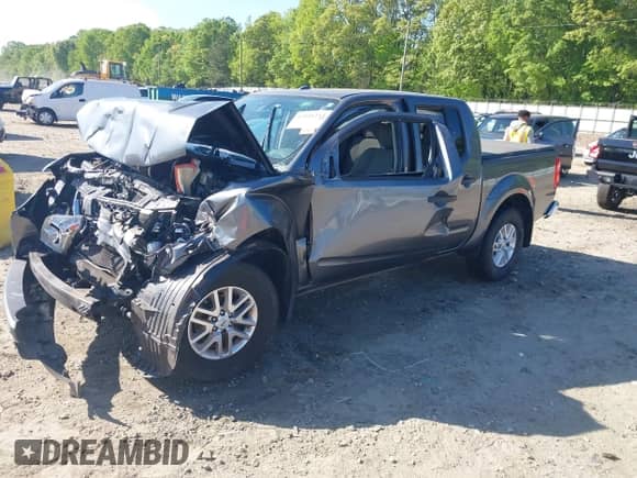 2016 Nissan Frontier SV with VIN 1N6AD0EV4GN787901, listed as a IAAI auction lot 42018254 with 120,845 mi miles and . Bid and sale history available at DreamBid. Image 2.
