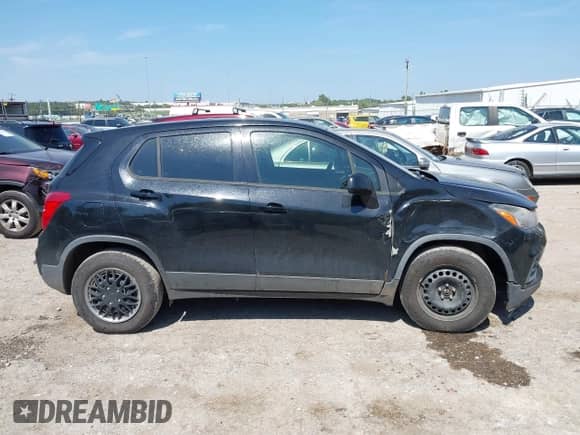 2018 Chevrolet Trax LS z VIN 3GNCJKSB3JL160860, wystawiony jako IAAI lot #43195256 z przebiegiem 128 748 mil mil oraz . Historia ofert i sprzedaży dostępna na DreamBid. Obrazek 13.