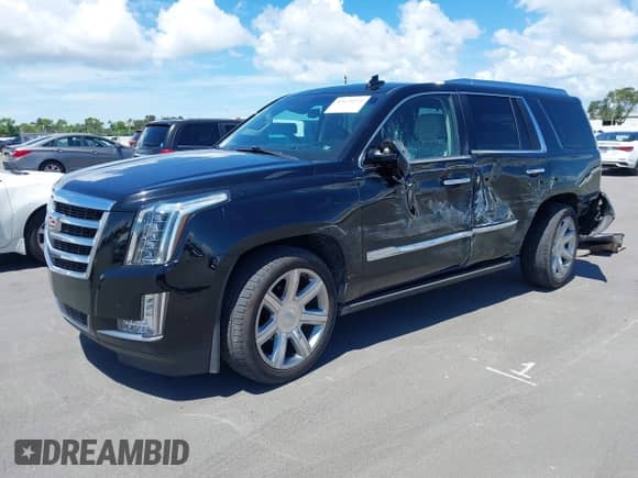 2018 Cadillac Escalade Premium Luxury z VIN 1GYS3CKJ9JR238685, wystawiony jako IAAI lot #43123271 z przebiegiem 82 195 mil mil oraz . Historia ofert i sprzedaży dostępna na DreamBid. Obrazek 2.