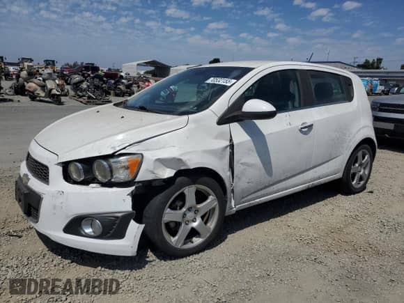 2015 Chevrolet Sonic LTZ with VIN 1G1JE6SB4F4122636, listed as a Copart auction lot 70532155 with 86,341 mi miles and Salvage title. Bid and sale history available at DreamBid. Image 1.