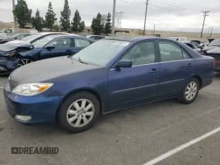 2004 Toyota Camry XLE with VIN 4T1BE32K24U300997, listed as a Copart auction lot 84366275 with 171,747 mi miles and Salvage title. Bid and sale history available at DreamBid. Image 1.