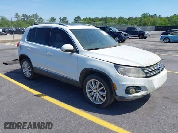 2015 Volkswagen Tiguan S with VIN WVGAV7AX4FW506314, listed as a IAAI auction lot 42063584 with 143,939 mi miles and . Bid and sale history available at DreamBid. Image 1.