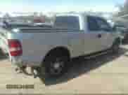 2005 Ford F-150 XLT with VIN 1FTPX145X5FB04425, listed as a IAAI auction lot 30871371 with 338,425 mi miles and . Bid and sale history available at DreamBid. Image 4.