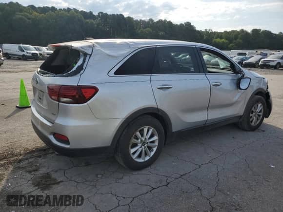 2019 Kia Sorento L with VIN 5XYPG4A35KG472847, listed as a Copart auction lot 70553065 with 168,022 mi miles and Salvage title. Bid and sale history available at DreamBid. Image 3.
