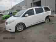 2012 Toyota Sienna XLE with VIN 5TDYK3DCXCS278781, listed as a Copart auction lot 83769325 with 157,885 mi miles and Salvage title. Bid and sale history available at DreamBid. Image 1.