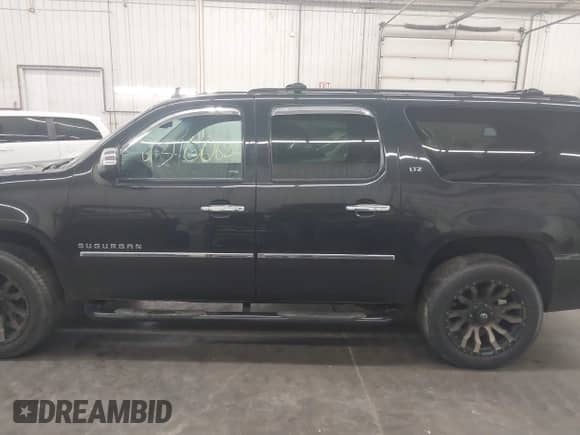 2013 Chevrolet Suburban LTZ с VIN 1GNSKKE70DR269628, выставлен на аукционе IAAI как лот 43460622 с пробегом 208 431 миль миль и . История ставок и продаж доступна на DreamBid. Изображение 14.