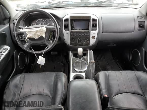 2007 Mercury Mariner Premier with VIN 4M2CU97107KJ17462, listed as a Copart auction lot 58582825 with Not provided miles and Salvage title. Bid and sale history available at DreamBid. Image 8.