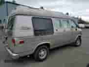 1992 Chevrolet Chevy Van с VIN 1GBEG25K2N7130047, выставлен на аукционе Copart как лот 68682724 с пробегом 143 585 миль миль и Списание • Salvage title. История ставок и продаж доступна на DreamBid. Изображение 3.