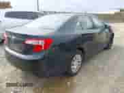 2014 Toyota Camry XLE with VIN 4T4BF1FK3ER375520, listed as a IAAI auction lot 43566867 with 242,702 mi miles and . Bid and sale history available at DreamBid. Image 4.