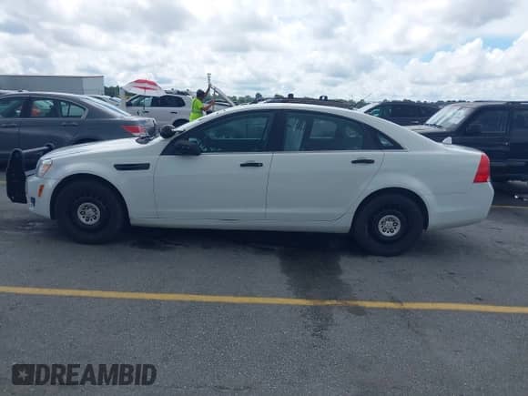 2014 Chevrolet Caprice Police Police with VIN 6G3NS5U27EL950499, listed as a IAAI auction lot 43005714 with 116,591 mi miles and . Bid and sale history available at DreamBid. Image 14.