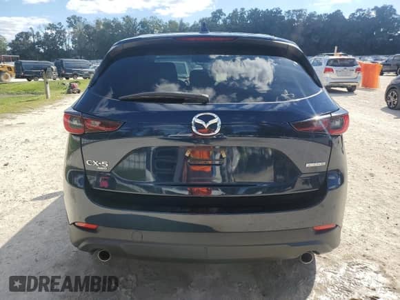 2023 Mazda CX-5 S Select z VIN JM3KFBBMXP0260507, wystawiony jako Copart lot #86469825 z przebiegiem 54 029 mil mil oraz Szkoda całkowita • Salvage title. Historia ofert i sprzedaży dostępna na DreamBid. Obrazek 6.